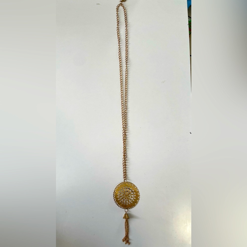 Gold tone long necklace